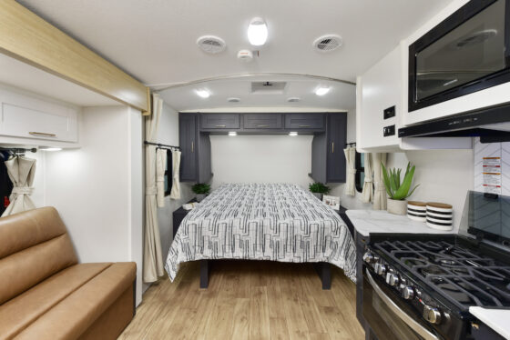 Interior view of the living area in a 2024 Mallard MA 210RB travel trailer by Heartland RVs.