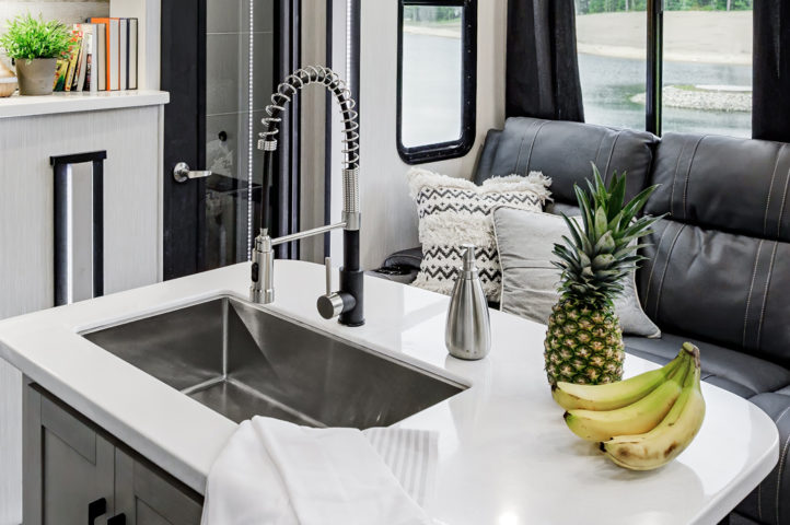 The interior of an RV, showing the living room.