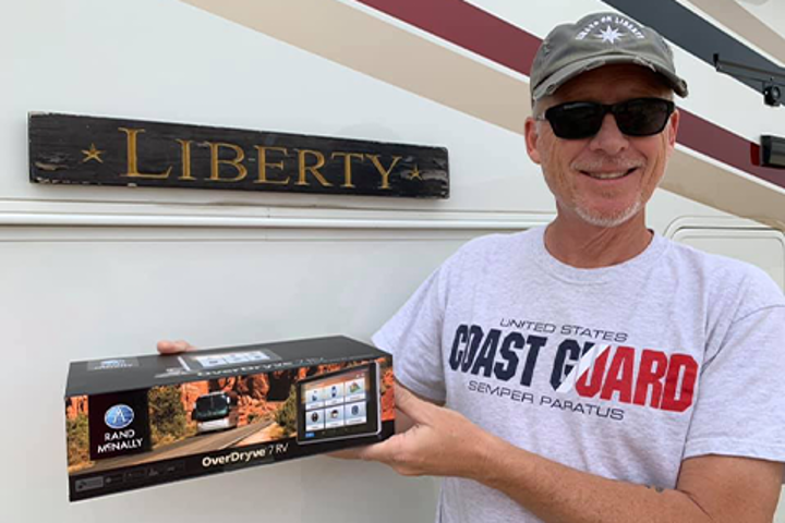 Dan holding the RV GPS box to show it off.