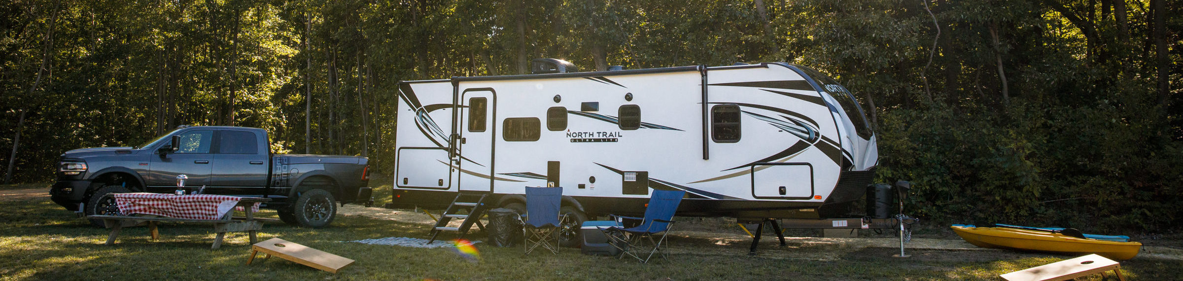 Heartland RV North Trail on Scenic Wooded Campsite
