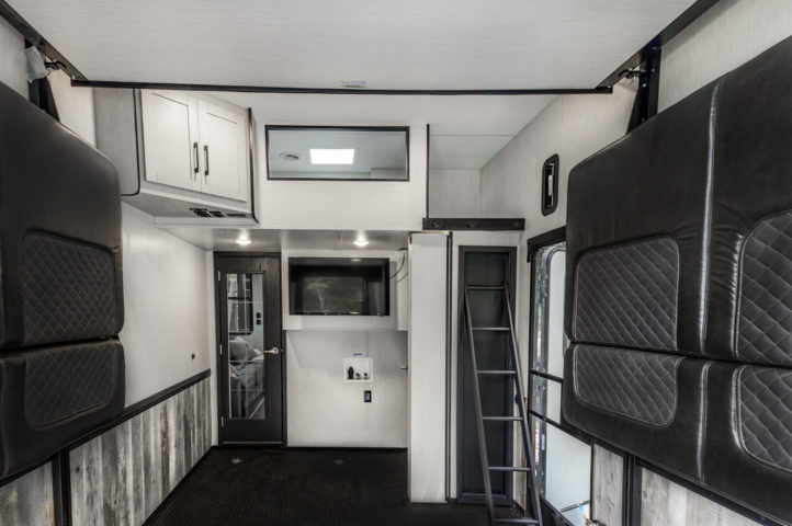 A view inside a toy hauler garage space without toys inside.