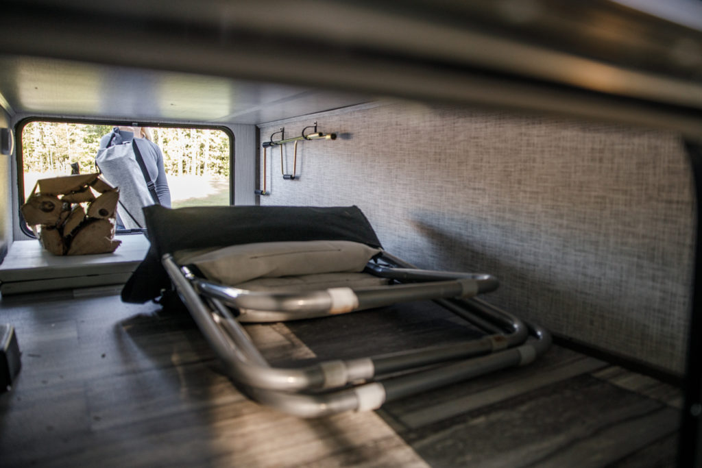 A view inside the underbelly storage of the North Trail travel trailer.