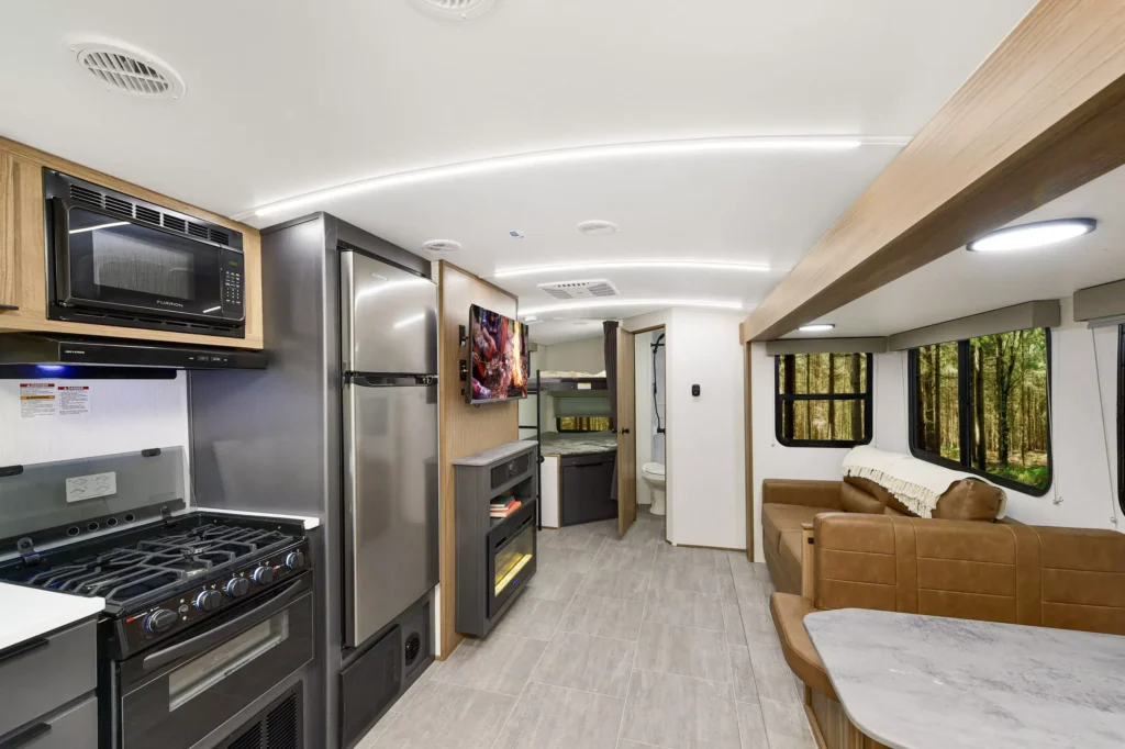 Interior view of the spacious and cozy living area in a Heartland RV CT TT 28.1BH model.