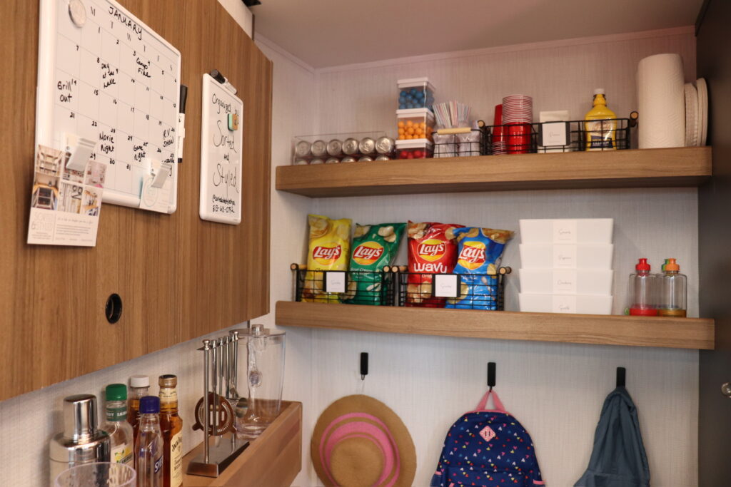 Using pegboards, hooks, and adhesives can create more organization without compromising on space.